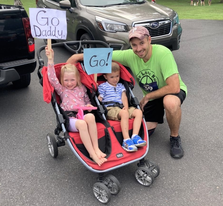jonathan and kids with signs