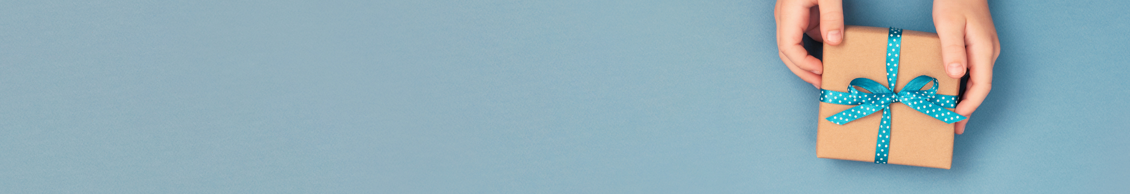 A gift box with a blue bow.